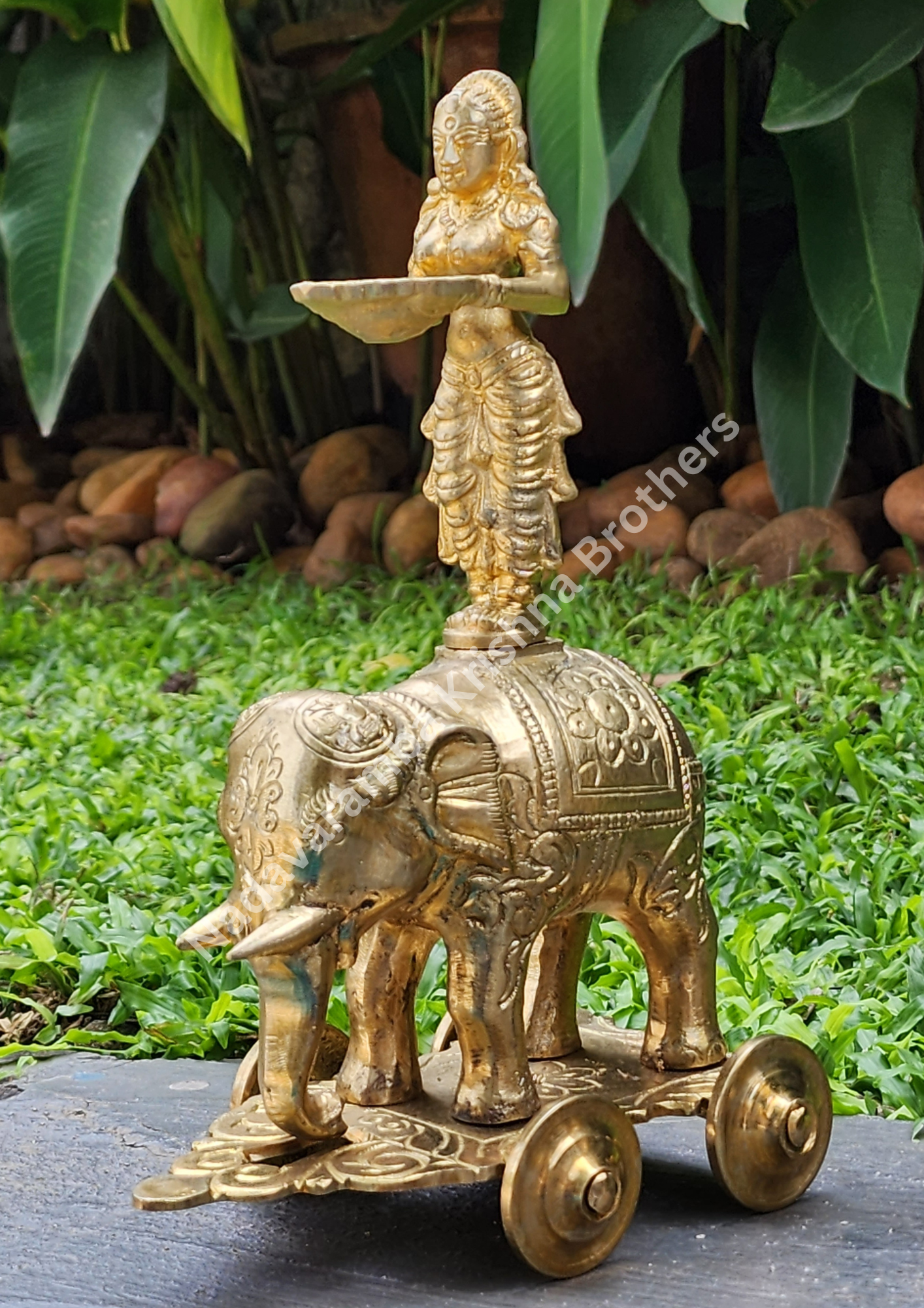 Pavai on Yanai Vilakku/Elephant Lamp with Wheels - Image 4