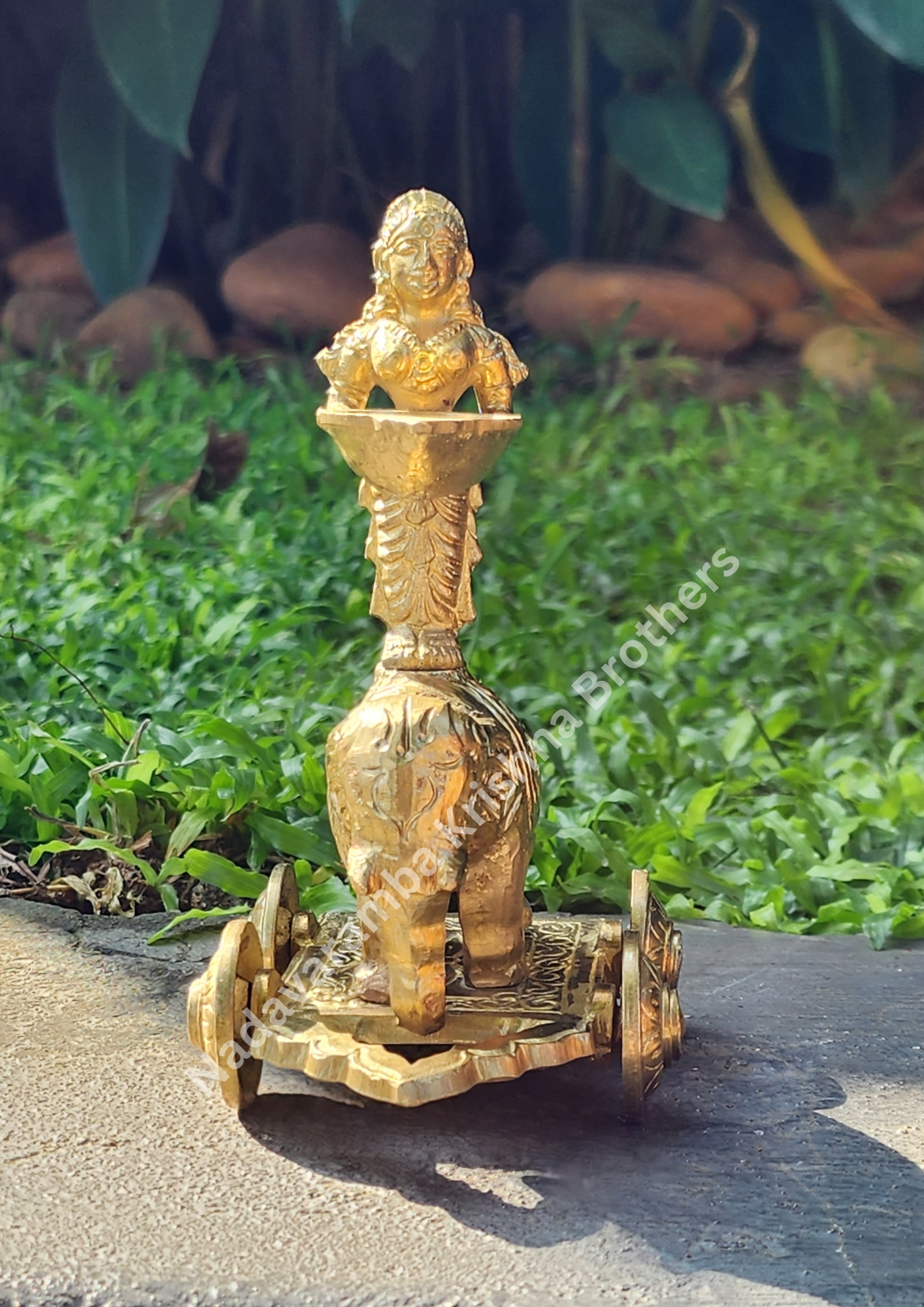 Pavai on Yanai Vilakku/Elephant Lamp with Wheels - Image 6