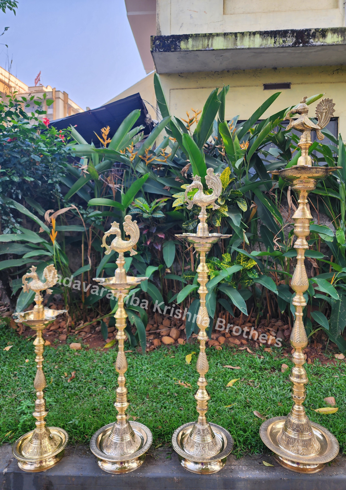 Bronze peacock nilavilakku